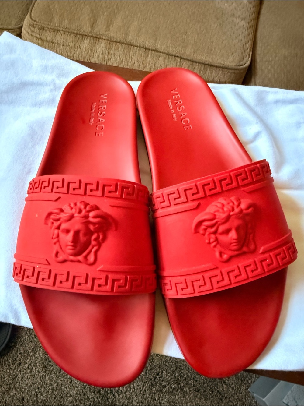 Red Versace poolside slides
